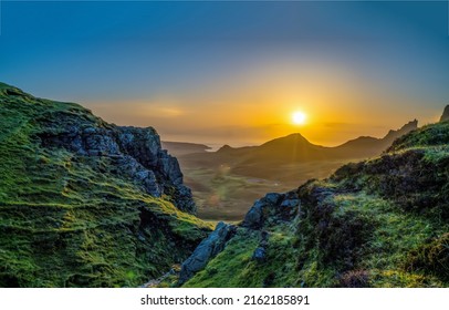 Sun at dawn. Sun over the valleys at dawn - Shutterstock ID 2162185891
