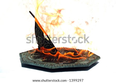 Sun dial in flames