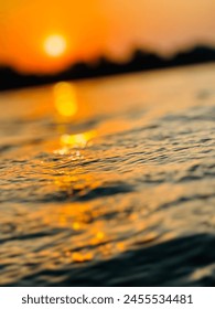As the sun dips behind the horizon, casting a warm glow over the verdant landscape of rolling hills and meandering rivers, you find yourself nestled amidst the tranquil embrace of nature.