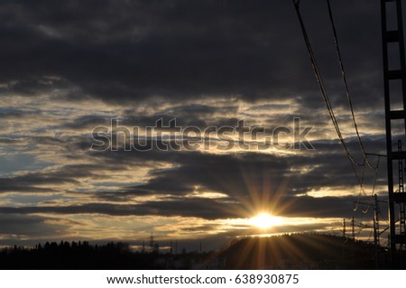 Sun down and clowds sky