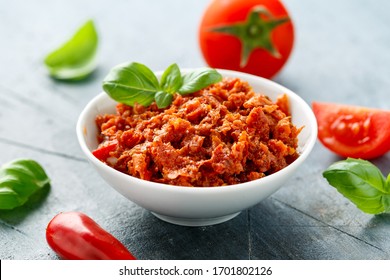 Sun Dried Tomato Pesto In White Bowl.