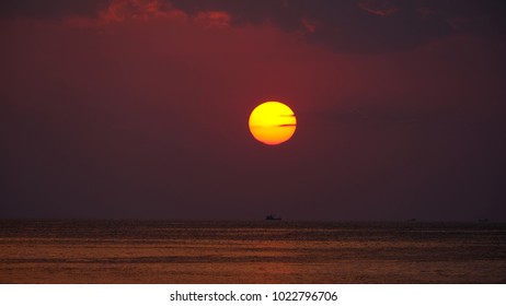 Sun Falling On Horizon Over Water  Is Beautiful Photo