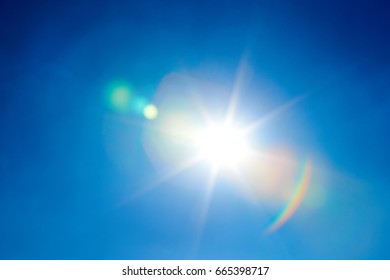 Sun Flare Isolated On Clear Blue Sky