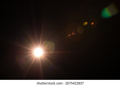 Sun flare on the black background