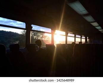 Sun flare through window of train in England