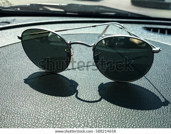 Sun glasses on the car
console