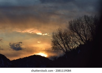 Sun Glowing Behind The Mountain
