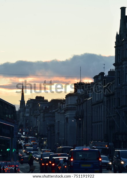 The sun goes down and\
traffic starts to build on Union Street, Aberdeen Scotland\'s main\
thoroughfare. 