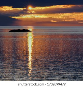 The Sun Going Down Over The Finnertys Taken From Spring Bay On The Off The Grid Lasqueti Island In The Strait Of Georgia, 50 Miles NW Of Vancouver Island, British Columbia, Canada.