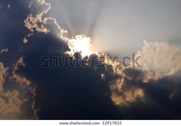 Sun Hidden Behind Clouds Rays Light Stock Photo (Edit Now) 12917833