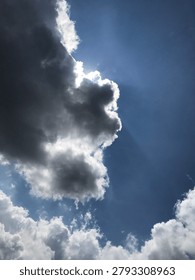 the sun hide behind clouds
