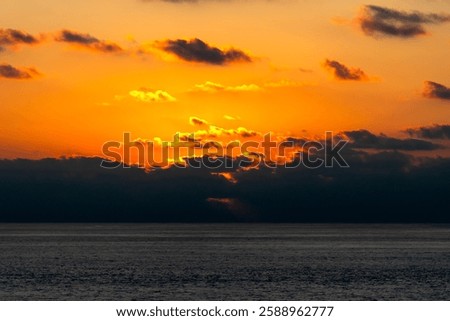 Similar – Image, Stock Photo The sun hides behind the clouds as we go to bed