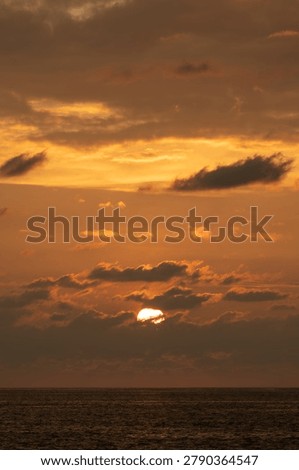 Sun is hiding behind the clouds