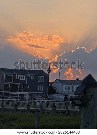 Sun hiding behind the clouds just before sunset 