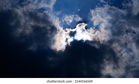 490 Sun hiding behind dark clouds Images, Stock Photos & Vectors ...