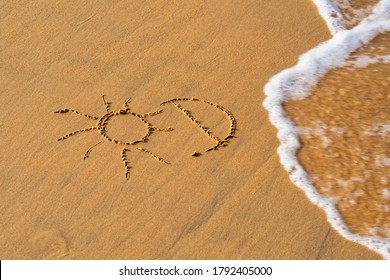 sol e inscripción Vitamina D en la playa de arena