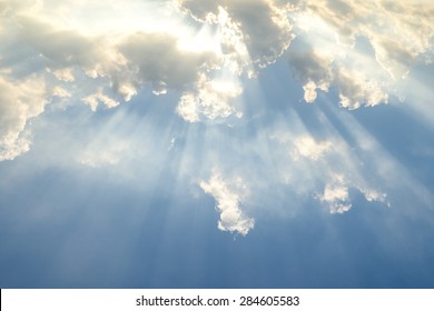 Sun Light Shining Through The Clouds