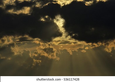 Sun Light Shining Through The Dark Cloud