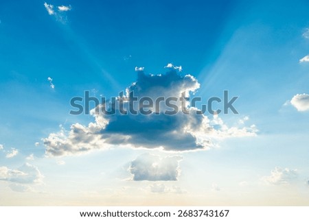 Sun light through cloud on blue sky. Blue sky, clouds and sun light