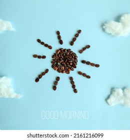 Sun made of coffee beans and white clouds with GOOD MORNING message against pastel blue background. Flat lay, copy space. Creative layout. Coffee art. Motivation. - Powered by Shutterstock