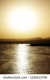 sun in the mountains