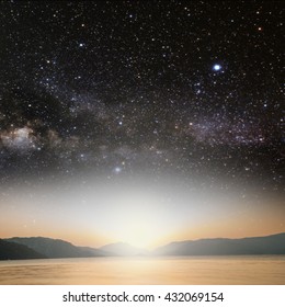 Sun On A Background Star Sky Reflected In The Sea. Elements Of This Image Furnished By NASA