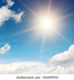 sun on beautiful blue sky - Shutterstock ID 326699933