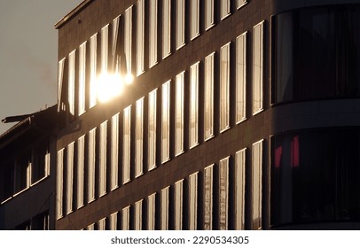    the sun on a skyscraper                            