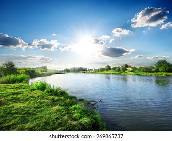 Sun Over Calm River In The Spring Morning