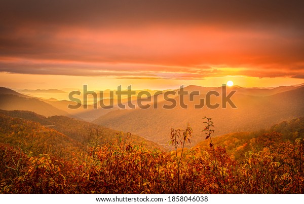 Sun Peaking Over The Mountains Over Maggie\
Valley\
This Was Taken On Heintooga Road Overlooking Maggie\
Valley.\
Maggie Valley, situated in North Carolina’s stunning Great\
Smoky Mountains, close to\
Great
