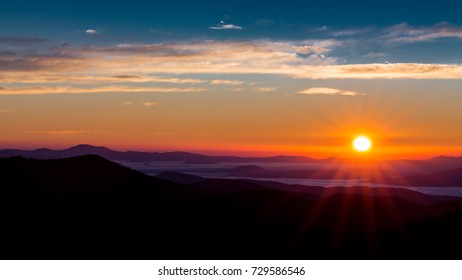 Sun Peaks Over The Mountain Peaks Of The Blue Ridge Parkway