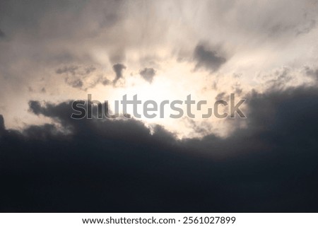 The sun peeking through the clouds