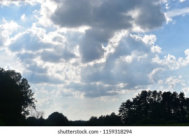 Sun Peeking thru Clouds