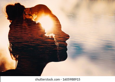 Sun peeks out from behind the clouds in woman's head.