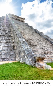 Sun Peering Over The Pyramid Of Kukulcan Or El Castillo At Chichen Itza, Mexico. For Centuries, At Sunset On Equinox Day, A Snake-like Shadow Descends On The Temple Stairs To A Snake Head At The Base.