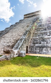 Sun Peering Over The Pyramid Of Kukulcan Or El Castillo At Chichen Itza, Mexico. For Centuries, At Sunset On Equinox Day, A Snake-like Shadow Descends On The Temple Stairs To A Snake Head At The Base.