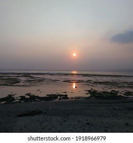 The Sun Played Upon The Water Reminding Me Of Skipping Rocks On A Calm Lake. Touches Of Pink And Purple Covered The Sky As The Cool Water Lapped Against The Sand