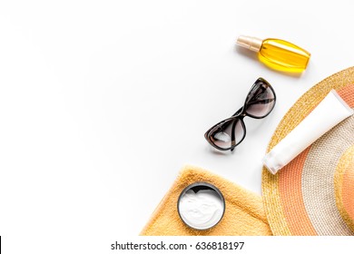 Sun Protection Composition With Glasses And Cream On White Background Top View Mockup