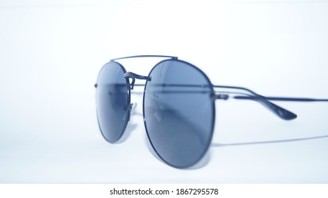 Sun protection glasses on white color