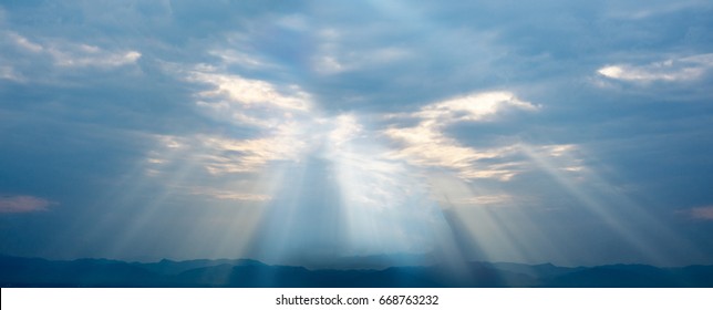 The Sun Ray Through The Beautiful Blue Cloud Sky