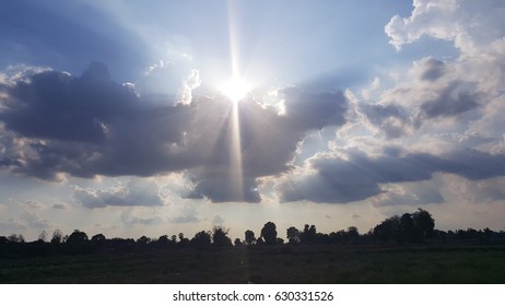 sun ray through clouds