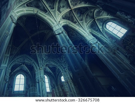 sun rays beaming through the old window of Latin Cathedral Imagine de stoc © 
