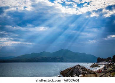 Sun Rays Break Through The Clouds