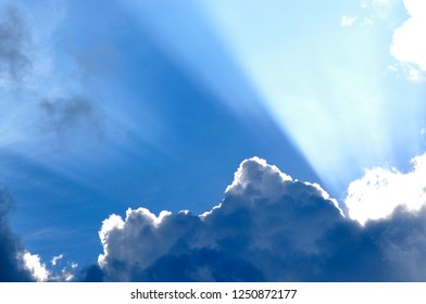 Sun rays breaking through clouds, Webster County, West Virginia, USA