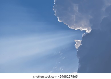 Sun rays breaking through clouds.