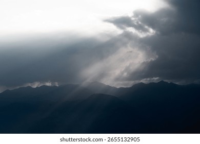 Sun Rays Breaking Through Clouds at Dusk