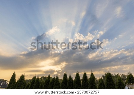 Sun rays come through the clouds