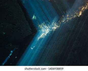 Sun rays entering the water .