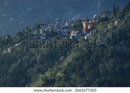 Sun rays falling on Himalayan mountain range, scenic beauty of layers of mountains, Okhrey, sikkim, India. Okhrey village a remote place in Sikkim where mountain range view is enjoyed by tourists.