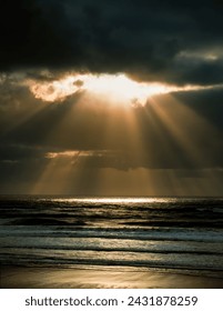 Sun rays make their way through dramatic clouds. Weather turns bad in the evening